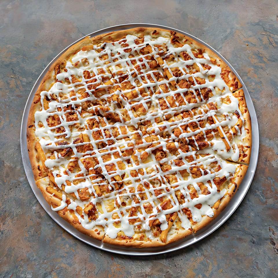 D-Ray's Pizzeria's buffalo chicken pizza, topped with fries and a white sauce drizzle.